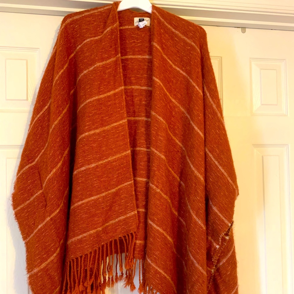Burnt Orange open sweater.